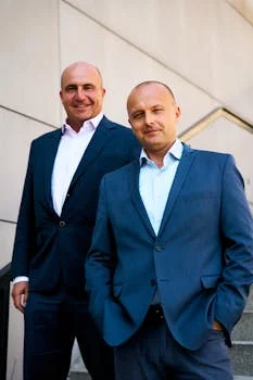smiling restaurant manager in professional attire